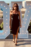 Usually I am a size small for most dresses, but based on the models sizing I knew I would fit better in an XS & I'm glad I ordered that because it fit perfect. Such a sexy dress! Very comfortable too! - Lauren R.
