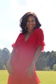 I wore this dress for my birthday--just to take photos and go to dinner in.  When it arrived, I was super pleased with the way that it fit: it was conservative and sexy all at once, and the bold red certainly made a statement.  Perfect in every way! - Kaelah P.