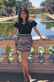 I had mixed feelings about this skirt when I bought it and figured I'd wait for it to arrive before making a judgment. As soon as I put it on, I was in love! It looks sort of like a decorative pillow haha but with a black top/bodysuit it's SO very cute. I got an insane amount of compliments when I wore it with a black off-the-shoulder bodysuit. Def a unique piece. I've tried wearing it with other color tops (colors that are on the skirt design) but I find myself always gravitating back to black. - Minal A.