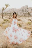 This is the perfect dress for engagement shoots! My fiance and I had our photoshoot in the desert and this dress flowed so elegantly. The dress is beautiful and a standout anywhere you go with it. The dress is a little too long and probably needed to be hemmed but it worked in my favor for what I used it for. (The photo was shot by @pariskarshphoto) - Stephanie N.