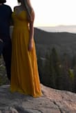 Such a beautiful dress. The color is very bright. It's a little big but luckily the straps are adjustable which is helpful. - Emily G.
