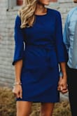 I wore this dress to my engagement photos and I really loved it. I actually tied it in the front to help give me more of a waistband. Very pretty dress! - Elaina M.