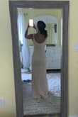 This dress is so pretty! It has adjustable straps, thick material and very flattering. I did return because I was using it for a fall formal event and decided to change colors. It also runs long so would have gotten it altered if I kept. - Kristin H.