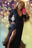 I loved how this dress fit me. Comfortable is my priority when it comes to a dress. It's very comfortable and classy. I got a lot of compliments. The only thing that I didn't like much is that it didn't cover my cleavage and the bra would show. I had to place a quick Safety pin. It was a last minute dress and didn't have time to do any type of alterations. - Geraldine G.