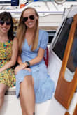Super cute dress, I love that it ties on the side (wrap dress), but even then, is a little large on me. I safety pin the neck line so I'm not flashing anyone the goods unknowingly. Great quality and looks good over a bathing suit or can be dressed up. - Kayley B.