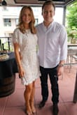 The dress fits loosely, but I wouldn't recommend ordering a size smaller. It was perfect for an outside engagement party- not too heavy, breathes well. - Emily F.