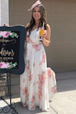 I wore this dress for my bridal shower and felt like a princess! I am typically between small and medium, and ordered a medium. It was beautiful on, but it did run a LITTLE big. I probably should've gotten a small. But because it is a wrap dress I could tie it tighter and it was perfect. Highly recommend! - Madison S.