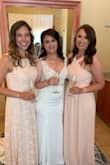 I wore this as a bridesmaid dress in my best friend's wedding this past summer and I couldn't have been happier with it! I have a large bust but a small waist and this dress provided perfect coverage. I usually have to wear a bra with everything, but I was able to get away without one and the dress was supportive enough and held everything in without being uncomfortable. I got tons of compliments on this dress. It was the perfect "blush" color and was elegant without trying too hard. It was a bit long, but with wedges it was manageable. I may have gotten it hemmed if I had had time, but even without hemming it was fine. I wish I had a reason to wear this dress again! - Tara S.