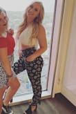This top is a little taller than I would like in the shoulders but if I change my posture its fine LOL. I personally wear a sticky bra would this. Would recommend. - Lindsay L.