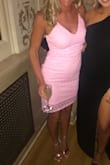 This dress was perfect for a summer wedding! The color was amazing with a tan and the fit of the dress was great! I wore it with a strapless bra, but would also be worn without a bra. Got so many complements on the dress. It's a big right around the legs, but I still was able to dance with it - Lauren M.