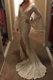 I'm having a small ceremony and this dress is prefect. I wanted something bohemian without the price tag. I'm usually a size 6 in Lulus so I had ordered a M. It was too big so I got a small and it fits like a glove. The lace is so beautiful and it hugs all the curves in just the right places. This dress looks like it costs way more than what I paid. Once again Lulus comes through. - Betsy C.