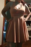 It's great material. Great quality. Could be worn with or without petals. It looks cute and is comfortable. I ordered a L because I usually run between a large and XL and didn't want the dress to be too big, and it fits perfectly. - Mariah H.