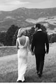 This dress was a huge hit at one of my best friend's weddings. Not only is it comfortable but the dress fit like a glove, covers fully in the front and is truly stunning in the back. I highly recommend this dress. - Whitney W.