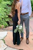 One of my best friends chose this dress for her bridesmaids dresses! So pretty and classic, but a bit of a pain. This dress is beautiful in theory, but fairly difficult to wear. I ordered "boob tape" online, for a few of us bridesmaids with 34C breasts, to wear with this dress because the low back makes it impossible to wear a real bra. Our tape didn't work very well, and some of the other bridesmaids had trouble with their stick-on bras too. Additionally, because it's tight-fitting, many of us wore spanx, but at least one bridesmaid had to fashion tape her spanx to her stomach to keep from showing a line. If we didn't wear spanx, the bride requested we wear no-show underwear or go commando, as to avoid panty lines. It was a little on the pricey side for many of us, but the bride tried her best to ensure we all had discount codes of some sort, and she had her heart set on long, black dresses for her wedding. And, even though I am semi-tall, I still had to get it hemmed, which cost $40 since it has two layers. With that said, the dress did look SO BEAUTIFUL with the greens and whites of the florals and natural scenery of her outdoor wedding. And, since we were all holding bouquets, that covered up our midsections since we were worried about our tummy areas in the tight dress. I may wear it again for another formal function in the future since it's classic in color and design, but I'll just be better about how to hold up my boobs lol. - Liz R.