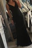 It fits great! Could probably get the straps shortened because it's a little big in the breast area. But overall such a comfy dress! Perfect with heels. Didn't have to get it hemmed! - Rebekah S.
