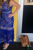 Love this dress! Note, this dress has no stretch at all so make to round up to the next size if need be. - Jennifer P.