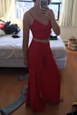 I wore this to a summer wedding and got endless compliments! The pants are super flowy and make your legs look a mile long! (I recommend wearing heels with it because the pants do run a little long)
I got it in red, which is vibrant and gorgeous.
If you're on the fence about this piece, I highly recommend it. - Melanie V.