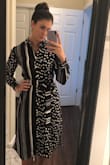 I love this dress. The material is thin, but not breathable or see-through. It is the perfect mix of professionalism & fun! - Brennan B.