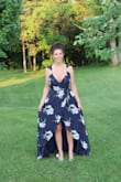 I love this dress I ordered a small, it is long so you'll want to wear high heels and on the back of the dress is a small hole to put the long string through to wrap around your waist and tie. The fabric is very nice. Very good quality. - Kimberly W.