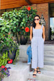 So comfy and stylish! The quality of the fabric is nice, it has a little weight to it but doesn't wrinkle. The ruffles on the shoulder straps keep it feminine while still being a structured jumpsuit. - Kim T.