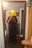 LOVE! I got this for my bridesmaid and it looks absolutely fabulous on. She typically wears between a 12 and 14, so on the safe side we got her an XL and it looks amazing. Fits her like a glove, not too tight or loose. She will have to tailor it as it's too long on the bottom, but that's alright. 

Very pleased with this jumpsuit. It's classy, the colour is beautiful and the material looks very expensive... which is always a plus when you're dressing up! - Courtney D.