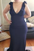 I loved how this dress fit. It was tight fitting but also was very comfortable and breathable. I did have to get it tailored from the bottom bcus it was a bit too long but otherwise I loved it. - JessicA U.