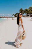 I wore this cute maxi dress in Bora Bora for my honeymoon. The quality of the dress is amazing. The fabric is heavy yet you can move around and be super comfortable. I recommend it to everyone for couples photo-shoot. - Meltem S.
