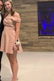 It fit really well and looked really great. My only issue was I wasn't expecting it to be that long and the off the shoulder part likes to flip up when you raise your arms so I would be mindful but it's really great quality and cute. - Sarah N.