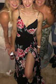 Loved this dress! I originally got a S but it was too loose around my chest/underarms. The XS was perfect! The fabric is thick and heavy enough that the slit opens effortlessly with a long stride. The straps are adjustable and waist ties 2X so there are no oops moments where your whole dress falls open. - Jessica D.