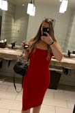 As my first purchase from Lulus I didn't really know what to expect but I was very pleasantly surprised! I normally stick to neutrals but bought this in red for a wedding and felt so confident all night, the color is vibrant and bold without being too bright. So many compliments on the dress and multiple comments on how flattering it was!! I expected a thinner material but this dress is actually pretty thick which is ideal for the bodycon style, I think it smoothed out my curves well. I considered wearing spanx but because I really didn't have any extra room in the dress they didn't work and it looked just fine without them! After reading the reviews I bought a size small which is almost never my size but it fit perfectly. The material did kind of fold a little bit but it was easy enough to tug it down and smooth it out once in a while! The only thing that was kind of off was the zipper, it's pretty long and due to my fairly large butt the material bunched up right at the end of the zipper/top of my butt, but it was totally unnoticeable if I made sure to yank it down before standing up. Perfect midi length on me! Also it seemed to give a little throughout the night which is what I was hoping for as it was just on the verge of being uncomfortably tight when i put it on, but the tight af look is what I was aiming for. - Kim M.