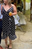 I am obsessed with this dress! I wasn't sure when I ordered it but when I tried it on I fell in love! The wrap defined my waist so well giving me an hourglass shape. The dress flowed so perfectly and was the perfect midi length for me! And I'm 5'2 so it's hard to find! Polka dots are huge for fall and this dress was perfect! Couldn't recommend enough :) - Amanda R.