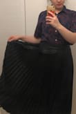 This is the skirt that I've been wanted! It's vegan leather, black, and pleated! Also appropriate for work since it is midi!! This will be my go-to skirt for the season yayyyyy - Kaylee M.