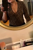 The body suit looks great on the model but didn't look too classy on me. This is great if you are going for the clubbing type outfit or maybe cougar or south side Chicago... just not my style. - Roz C.
