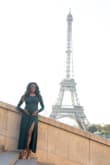 I purchased this dress for a maternity shoot. Not knowing my size I got a large and it was always too big. When I was in Paris I got it tailored to fit my belly and it worked out perfectly. I believe because of the fabric I could have gotten a small. Either way the dress was perfect. - Crystal W.