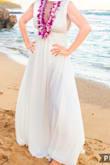 This dress was amazing! Ordered it for a vow renewal. I first ordered a small after reading reviews and while I could zip it, I could barely breathe- the dress was tight only right where it hits under the chest. I returned it for a medium which wasn't much bigger, but worked! Like the other reviews said- it's super long and I had to alter the bottom. I actually altered the straps having them tightened a bit so they wouldn't slip and the only bummer there was that it was another $70 in alterations. For my occasion I didn't mind the extra costs, but otherwise I would probably have just returned it. - Haley M.