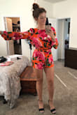 First I have to say that I LOVED this romper from seeing it online to trying it on. I tried talking myself into keeping it, but I couldn't raise my arms so it had to be returned. The medium fit perfectly everywhere (I just don't think this is made for girls with long torsos)... I wouldn't recommend going larger if you're around my sizing because everywhere else would have been way too baggy. Bought this initially for my housewarming party, but this could go with any event. Still bummed I had to return it. - Kimberly L.