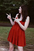 I wore this for my engagement pictures! It is super cute and flowy at the bottom, and the red color was really pretty. The material was sturdy, so I don't feel like it's a cheaply made dress. I'm really tall so it was kinda short for my liking, but for the engagement pictures it was perfect. I probably wouldn't wear it to a wedding for fear my booty would hang out, but I would do a date night or something else in it. - Lindsey F.