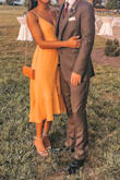 I wore this dress to a wedding and got so many compliments. The color is a beautiful orange/yellow and looks great with golden accessories. Love love love ! - Bianca C.
