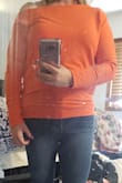 I love this top, it is great for fall and winter. I am in between a large and medium but I ordered the medium and it still fits comfortably. - Emily C.