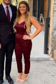 This jumpsuit is amazing! I bought it to wear to a wedding and it was great for the occasion. The material is great quality and it fits true to size. The material has a little bit of stretch in it so it's easy to move in. I had to get the pant legs hemmed because they were too long but I was expecting that from the reviews. - Kelsey H.