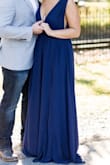 This dress is great for formal events. I wore this specifically for my engagement pictures, but you could definitely wear this to a wedding. The material had a great weight to it. It was slightly lose on the chest area, but alterations could potentially fix that. The color is great and it has a good quality about it. Only downside is that it is just about an inch-inch and a half too long.. - Shannon H.