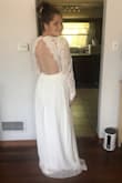 I've been wanting this dress for a couple of years and finally got it for my reception dress. I think it's gorgeous, but it is crazy long (which I'm sure is a plus for some people) and the sleeve a very baggy. With a few alterations, it'll be perfect! - Emily G.