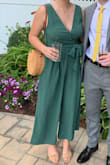 I love this jumpsuit, it was super comfortable and stylish. The tie waist makes it extremely flattering. Length was perfect with 3 in heels. The only thing is it's a little low cut, so I sewed up the front about 3 inches to conceal my bra showing/some cleavage. I wore a sticky bra and had no problems, probably could've worn a regular bra but I didn't want to deal with making sure straps were tucked in. - Belle N.