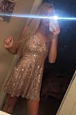 It's a cute dress, but the color isn't as bold as it is in the picture. It's fits pretty well and it's good quality. - Lynn C.