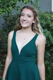 I ordered a medium because of the size chart, but I ended up altering the length shorter (to make it high school appropriate) and the waist to be smaller just because of how it fit my bust. Still super cute for homecoming! - Rachel G.