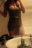 I absolutely love this dress. The color is light olive and looks beautiful. The fit is also great. I have worn this several times including while I was pregnant and after. I have gotten this dress in black and rose and I have to admit it doesn't fit the same. - Melissa A.