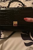 I totally love this purse. The crocodile design is absolutely beautiful! Looks very expensive and it's a good size. I love it so much had to order the other color. :) - Martha M.