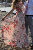 I wore this dress to a wedding on the beach and got so many compliments. My only complaint is how tight it is around my rib cage area makes it so it sort of rides up and does not stay put. However, there is non slip edging in the dress and that helped a lot! The dress was also long enough for me to wear 3 inch heels and it not look too short. - Nicole S.