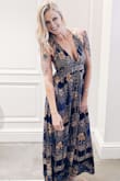 I was nervous about wearing this without a bra, but with pasties on it was perfect! Never felt like I was going to fall out. I got lots of compliments on it. Love this dress so much! - Alisha S.