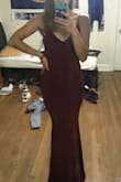 i love this dress! i bought this for the navy/marine corps birthday ball and its perfect. I am a pretty lean athlete but also pretty muscular and am usually a medium but after reading the reviews i ordered an XS. i think ill order a small just for comfort but the XS its tight but still looks really good. this dress is also long enough for someone tall like me to wear 4-5in heels. i also dont need to wear a bra with this dress and the adjustable straps are a great design.

also pls ignore my boyfriends messy room lol - Emily H.